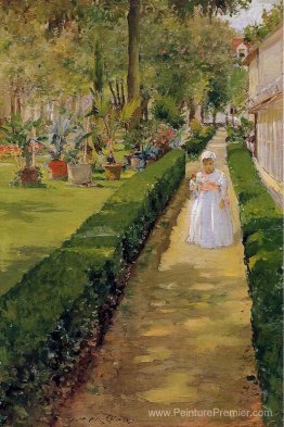 Enfant sur une promenade de jardin