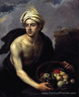 Un jeune homme avec un panier de fruits