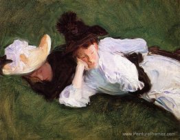 Deux filles allongées sur l'herbe