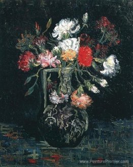 Vase avec des œillets blancs et rouges