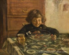 Un enfant assis une table