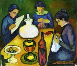 Trois femmes à la table par la lampe