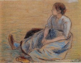 Femme assise sur le sol