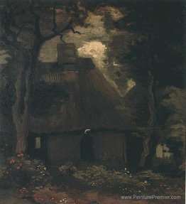 Cottage avec des arbres et une paysanne