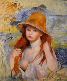 Jeune femme dans un chapeau de paille