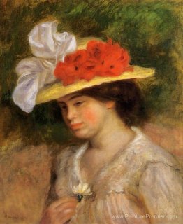 Femme dans un chapeau à fleurs