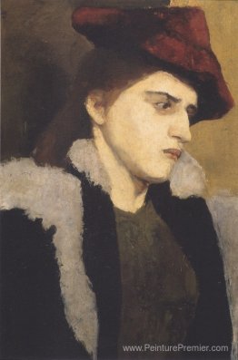 Portrait d'une jeune femme avec un chapeau rouge