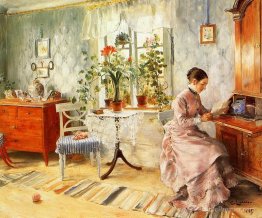 Un intérieur avec une femme lisant