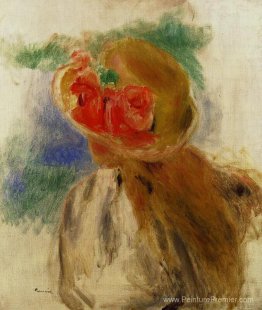 Jeune fille dans un chapeau à fleurs