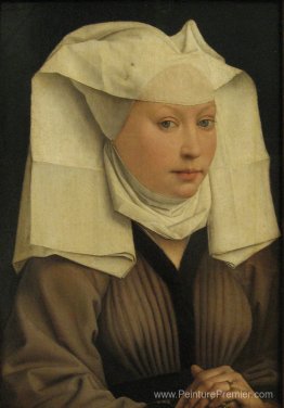 Portrait d'une jeune femme dans un chapeau épinglé