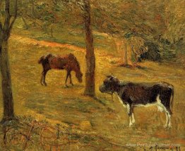 Cheval et vache dans une prairie