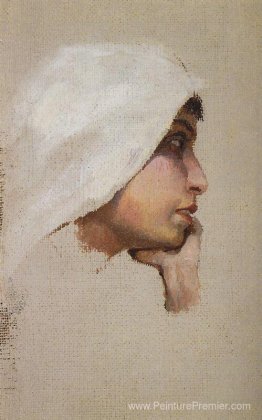 La tête d'une jeune femme dans un voile blanc