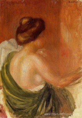 Femme assise dans une robe verte