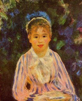 Jeune femme dans une chemise à rayures bleues et roses