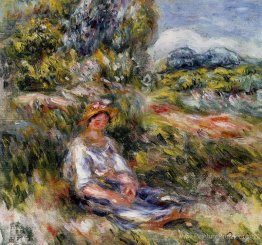 Jeune fille assise dans une prairie