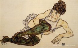 Femme allongée avec des bas verts (Adele Harms)