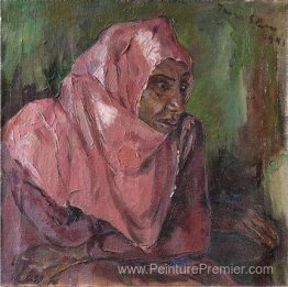 Portrait d'une femme portant un hijab rose