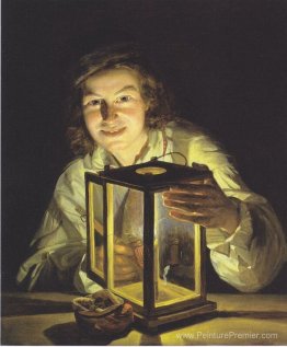 Le jeune garçon avec le lantern stable