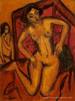 Femme nue à genoux avant un écran rouge