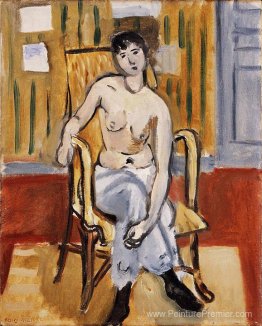 Figure assise, chambre bronzée