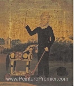 Jeune garçon avec cheval jouet
