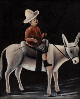 Un garçon sur un âne