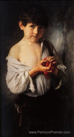 Garçon avec des cerises